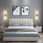 Modern gold LED wall sconce in a bedroom