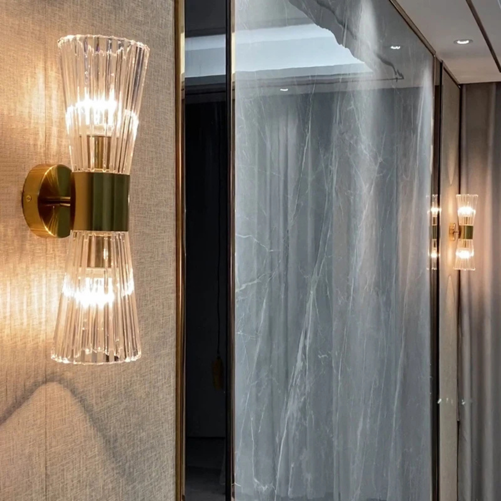 Modern gold wall sconce in a living room