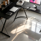 Spacious work surface of modern L-shaped office desk