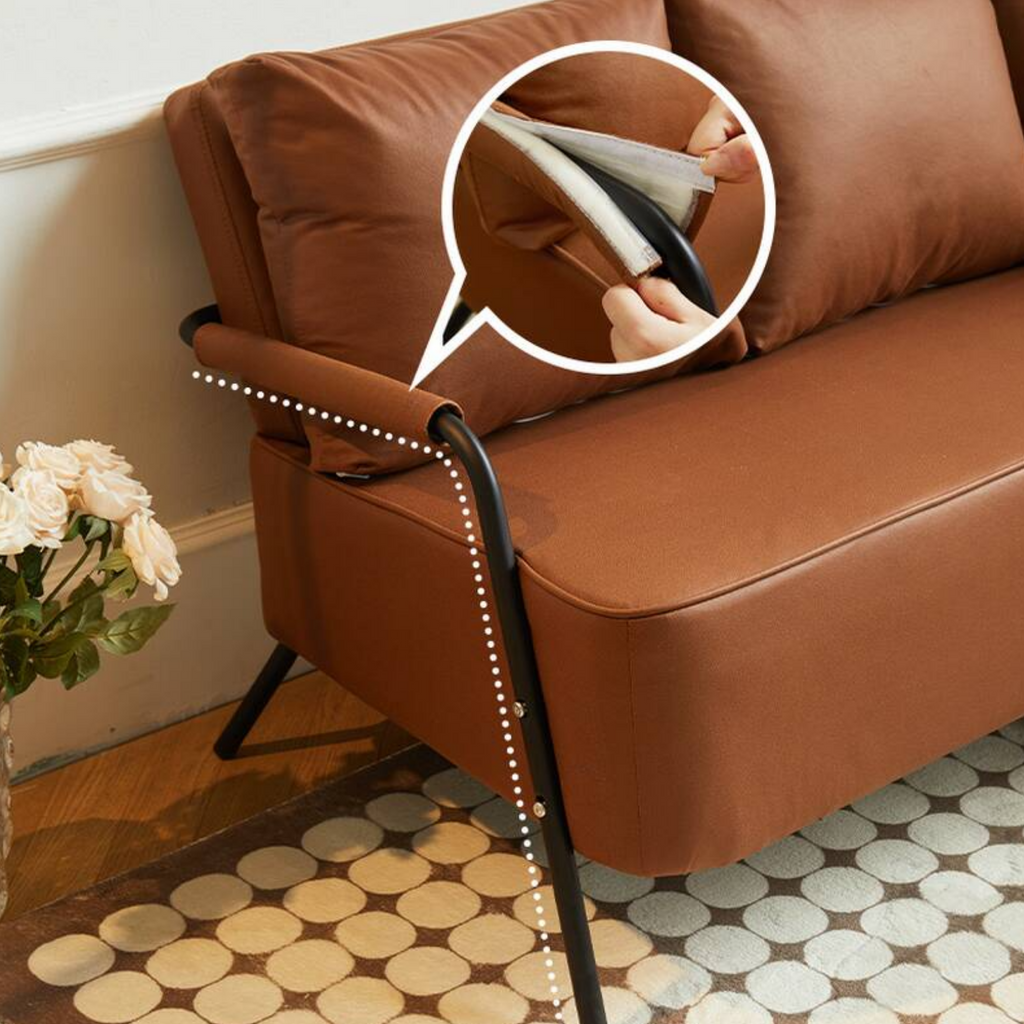 Armrest detail on modern upholstered leather sofa