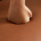 Close-up of leather upholstery on modern living room sofa