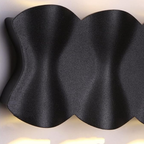 Close-up of the aluminum body of the LED wall sconce