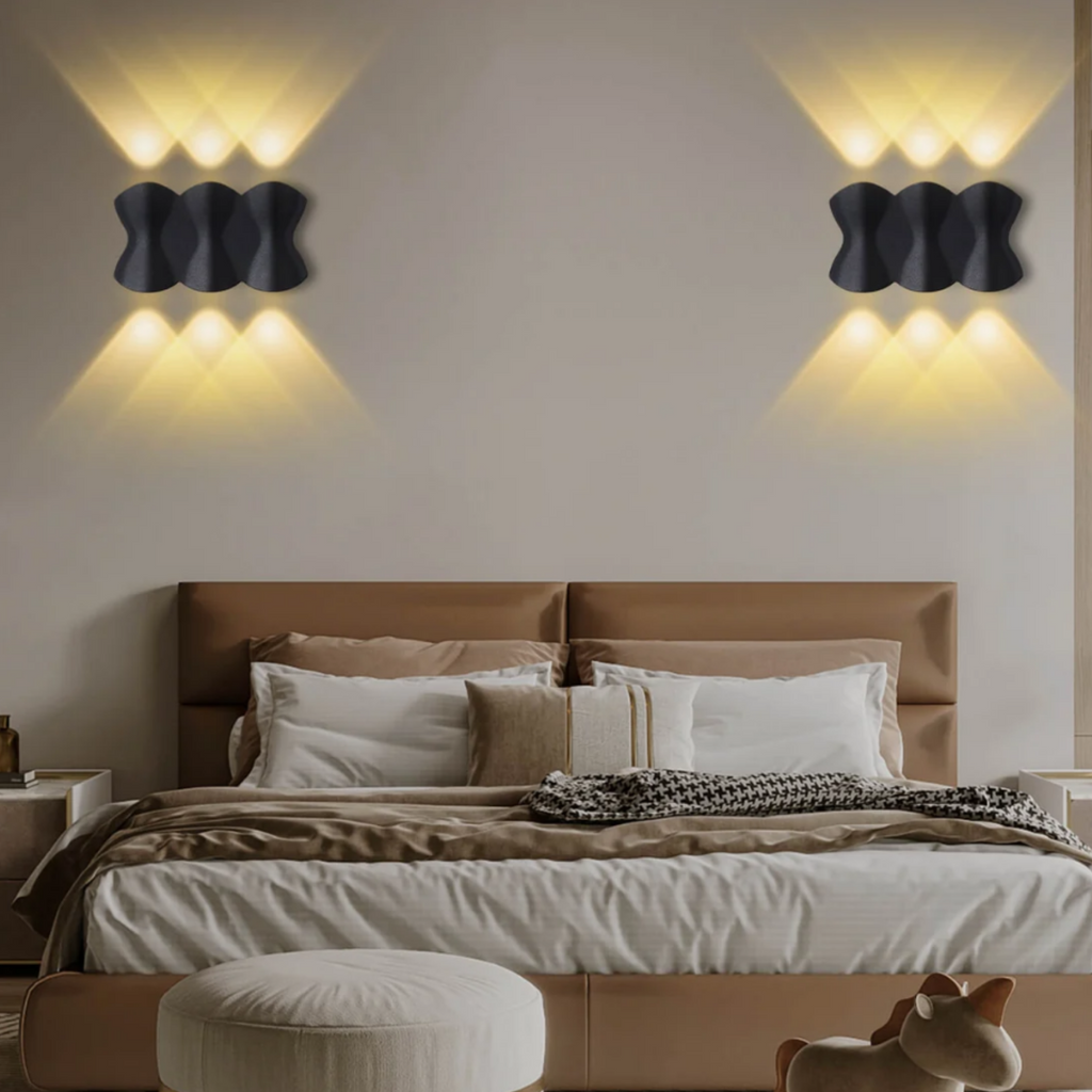Modern linear LED wall sconce in a bedroom