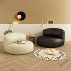 Modern semicircular lounge chair in a living room