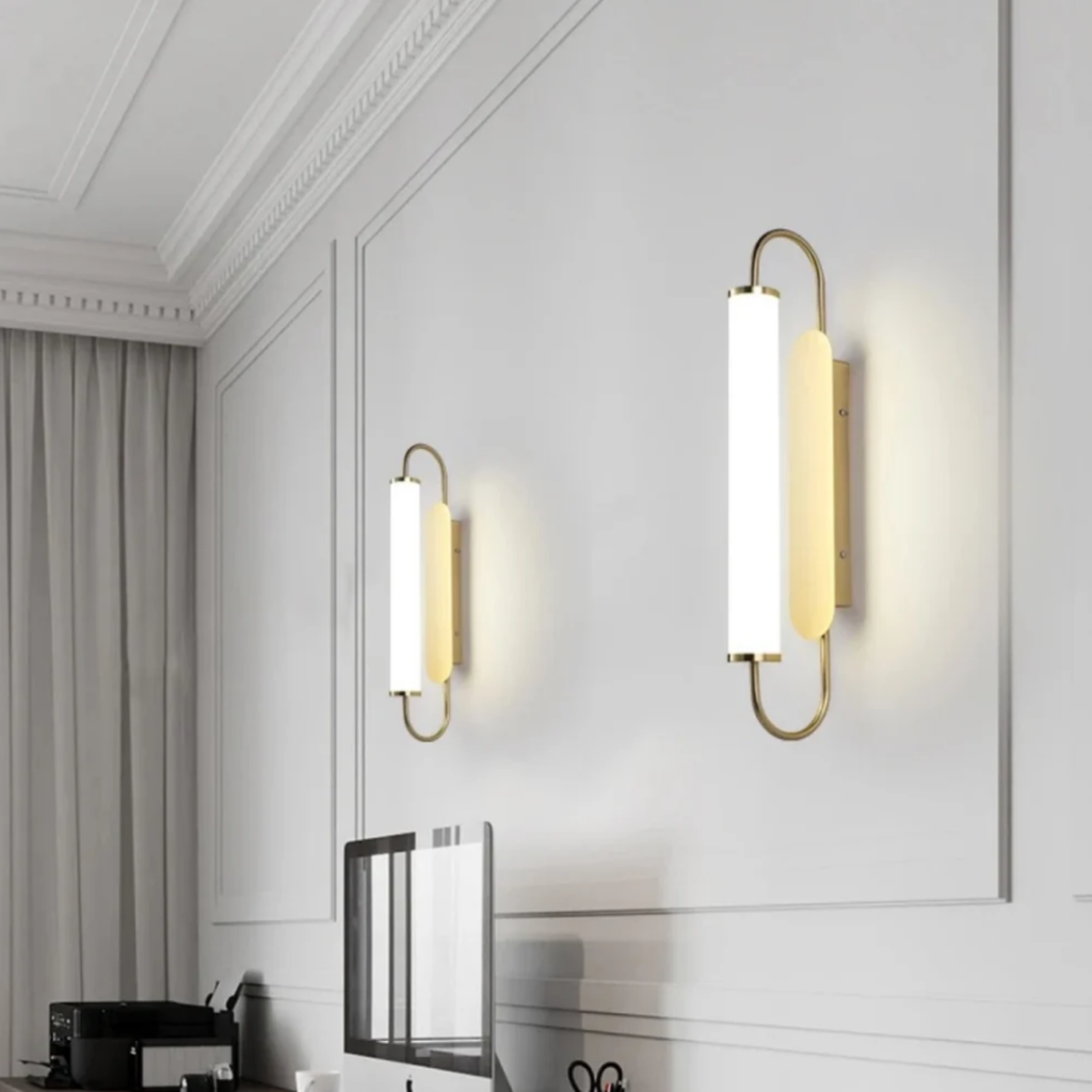 Modern luxury gold LED wall sconce in a cabinet