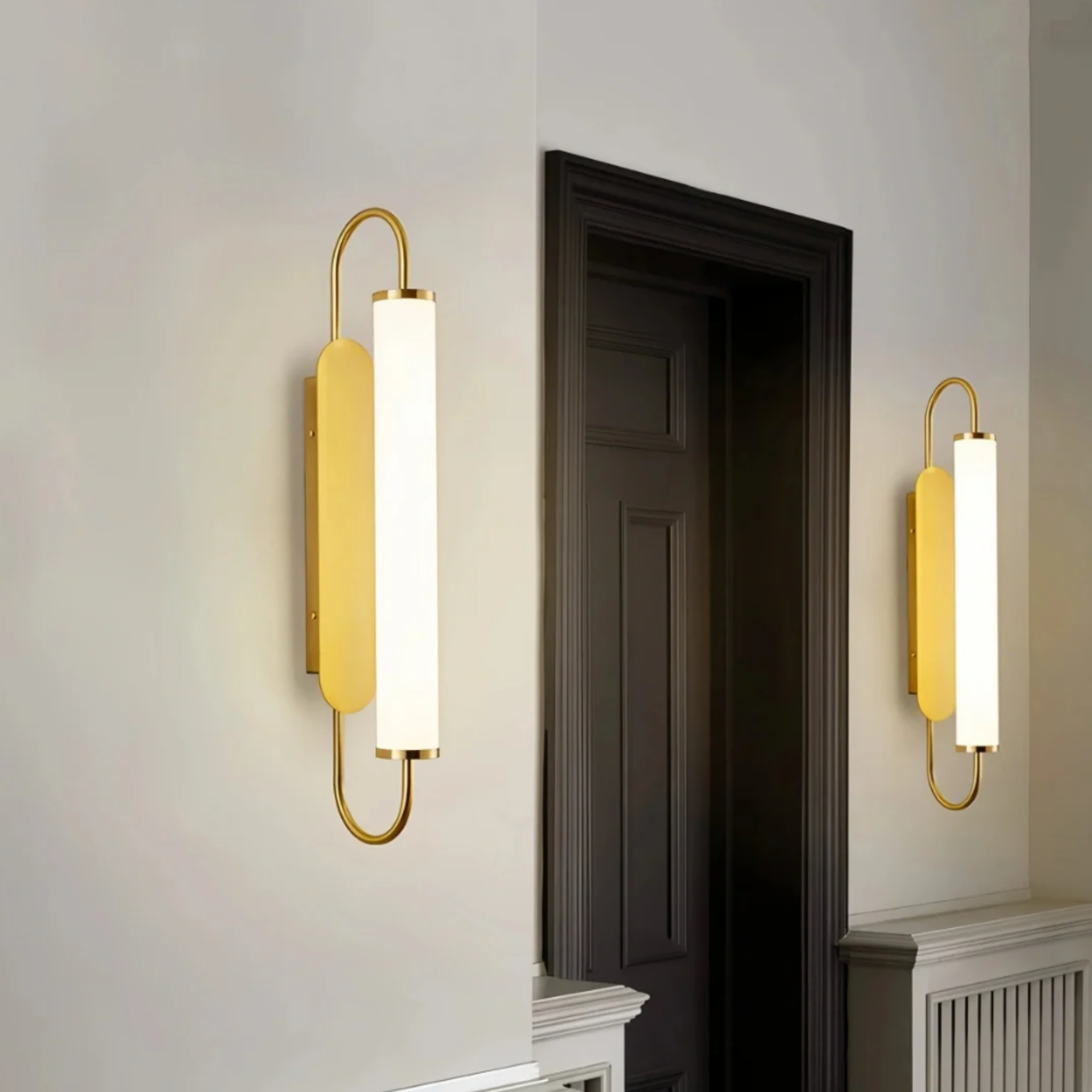 Modern luxury gold LED wall sconce in a hotel interior