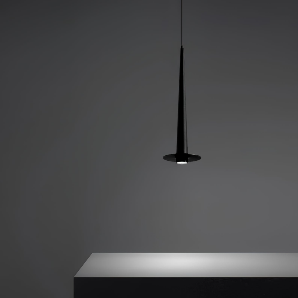 Modern minimalist black aluminum stick LED pendant ceiling light above a kitchen island