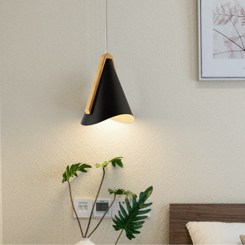 Modern Nordic cone LED pendant light in a bedroom