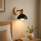 Modern Nordic wall lamp beside a bed