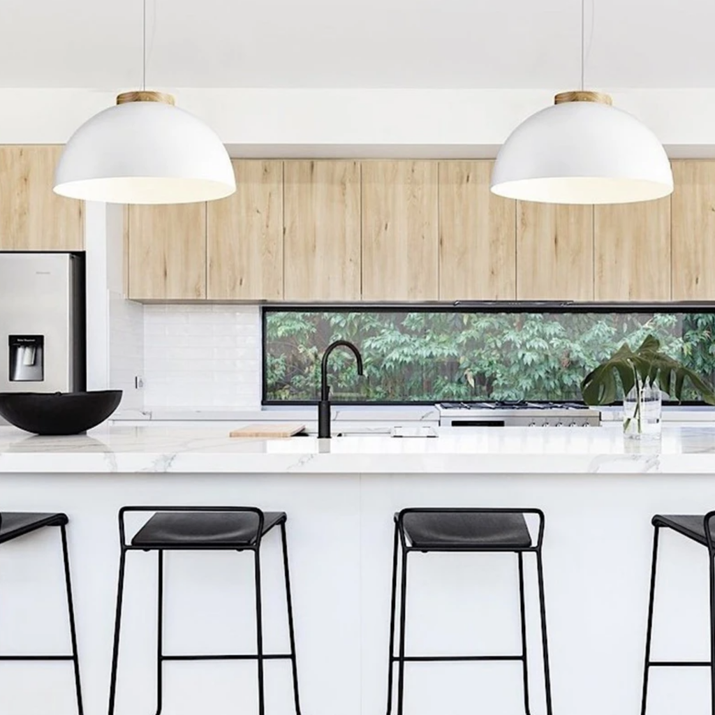 Modern Nordic wooden LED pendant light above a kitchen island