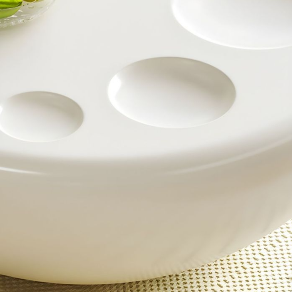 Smooth surface of the modern round coffee table
