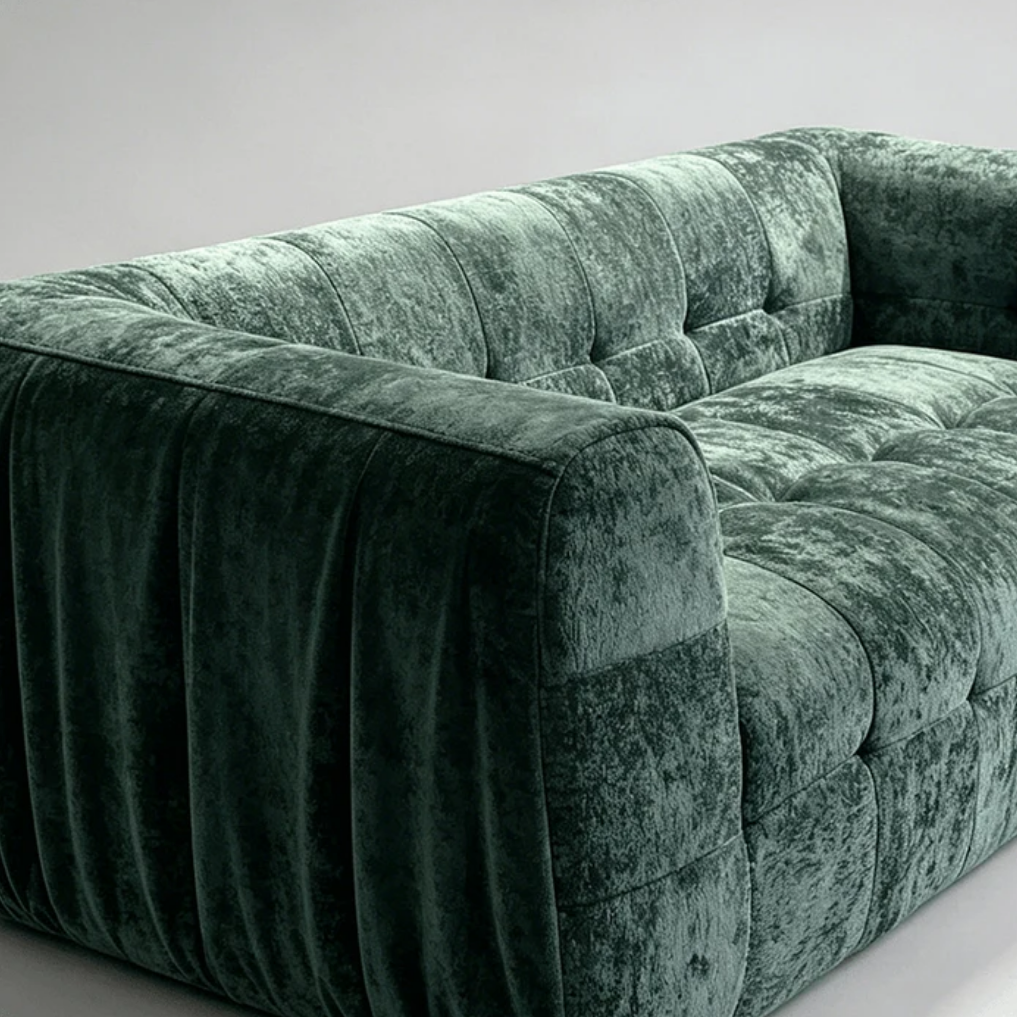 Angled view of tufted fabric sofa