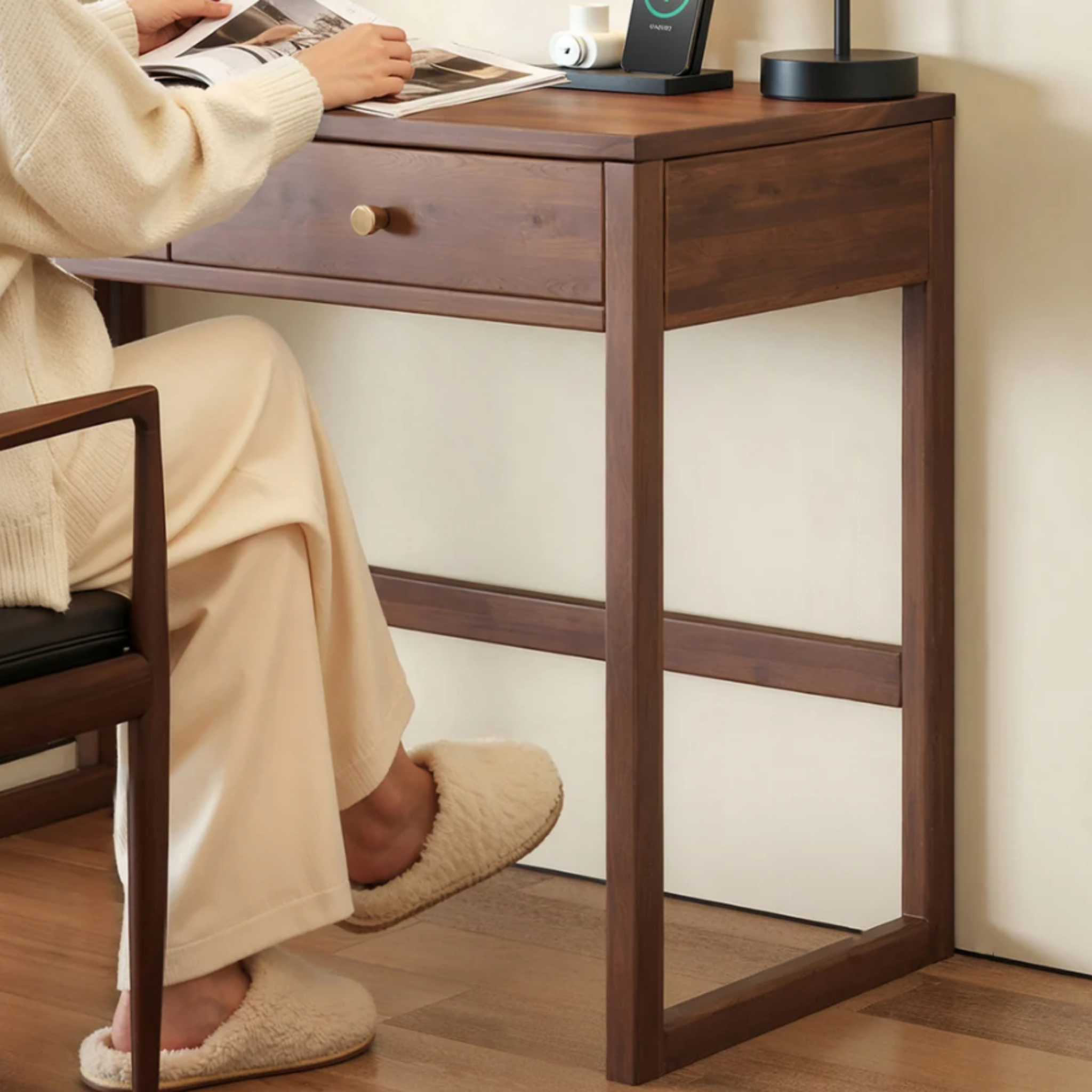 Angled view of the modern solid rubberwood writing desk with 1 drawer in walnut