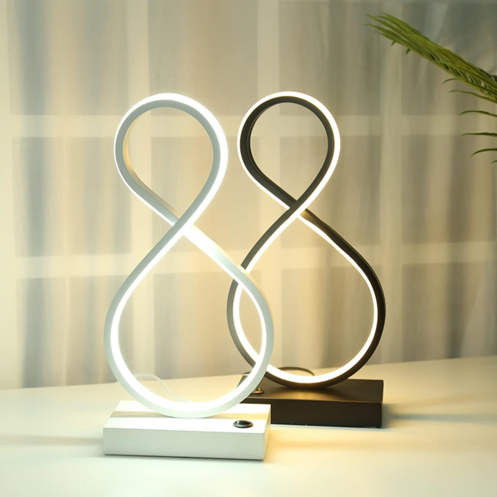 Modern spiral LED table lamp available in black and white