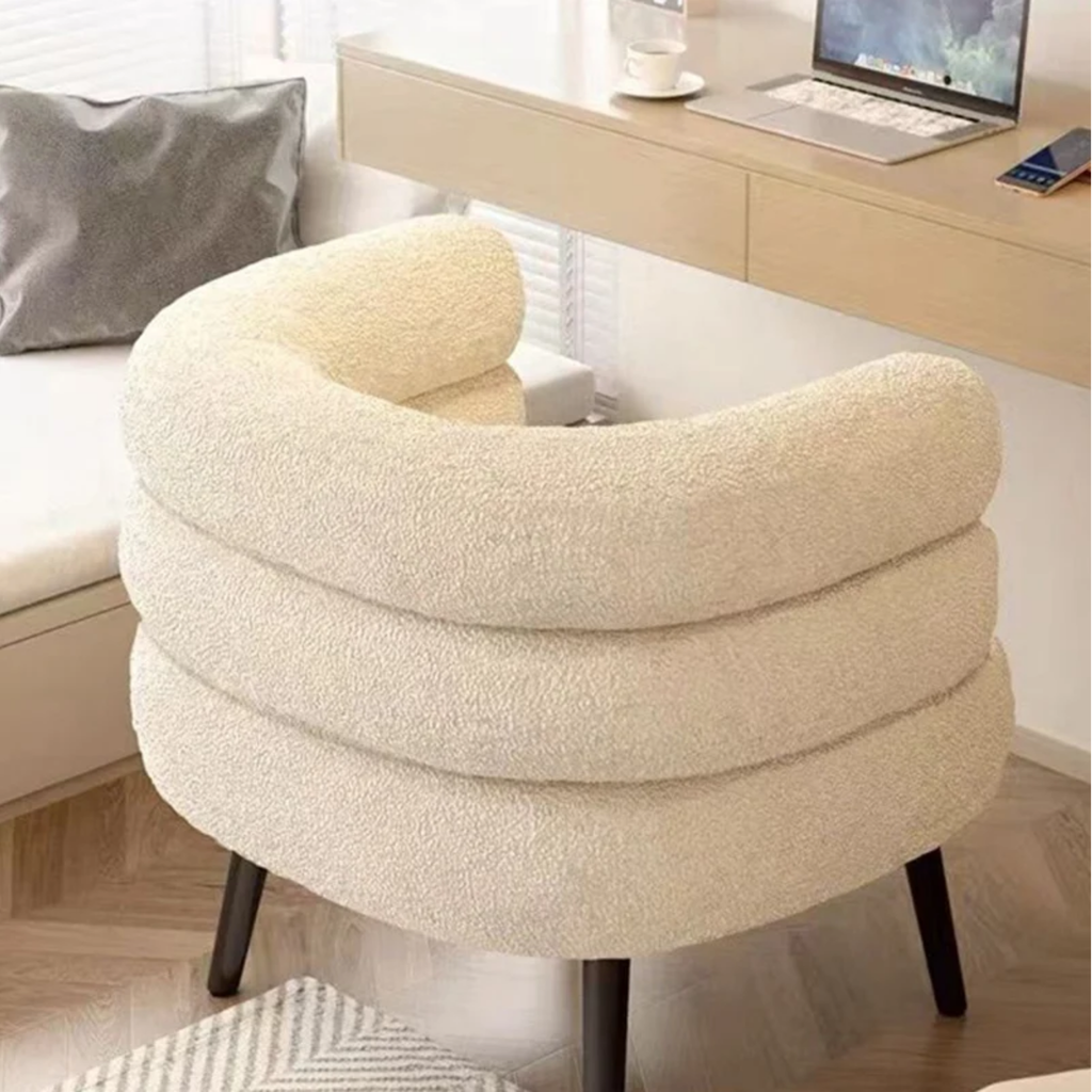 Back view of modern curved teddy accent chair