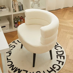 Side view of modern teddy fleece accent chair with metal legs