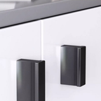 Drawer handle detail on modern TV stand
