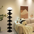 Nordic cream gourd floor lamp next to a living room sofa