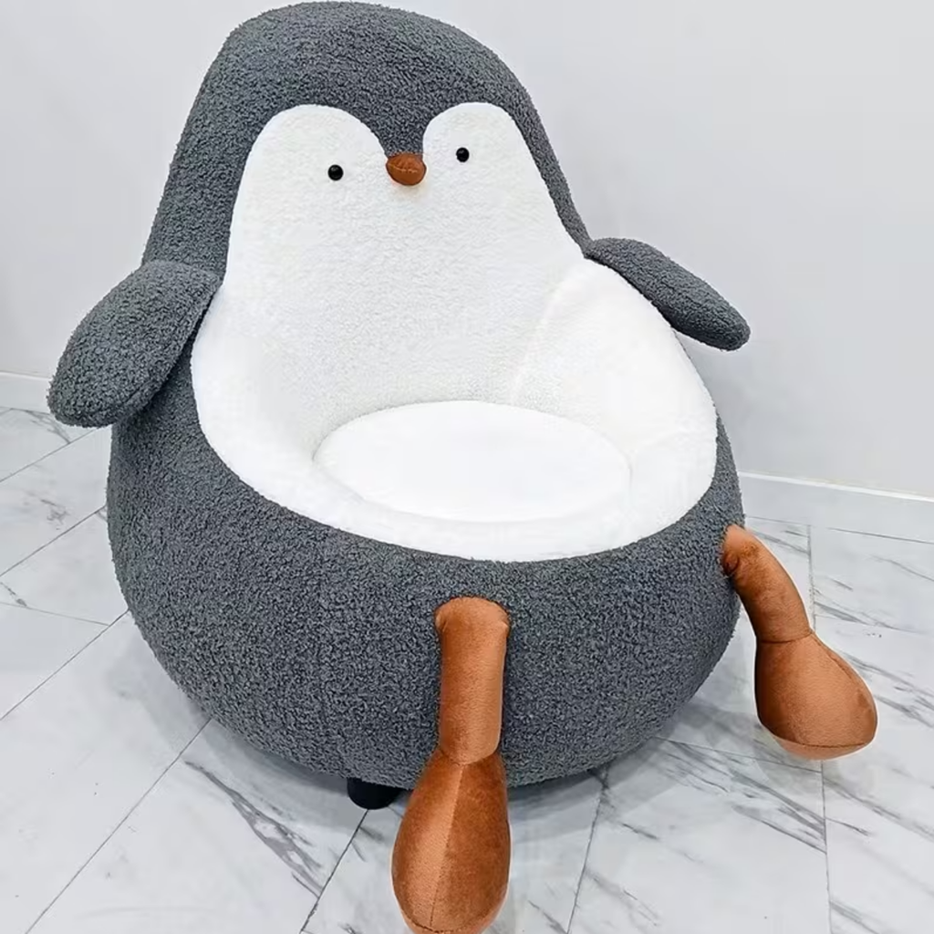 Side view of penguin shaped kids lounge chair