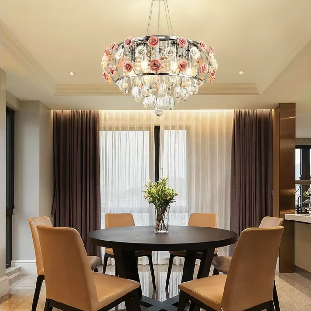 Pink rose crystal glass pendant light above a dining table