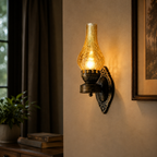 Retro kerosene-style wall sconce with glass shade