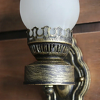 E26 bulb holder on the retro kerosene-style wall sconce