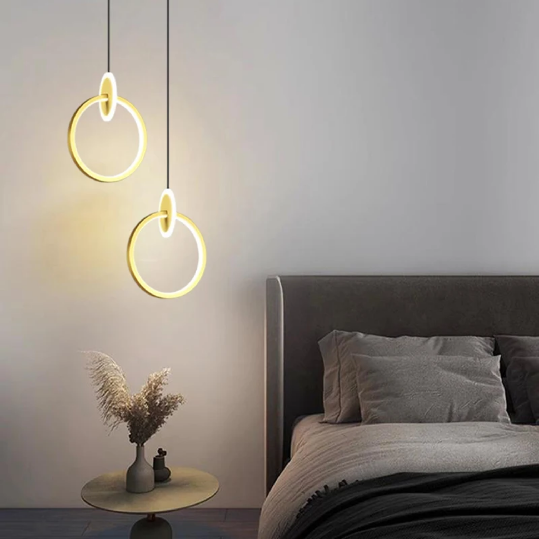 Modern 2-head round LED hanging light in a bedroom 