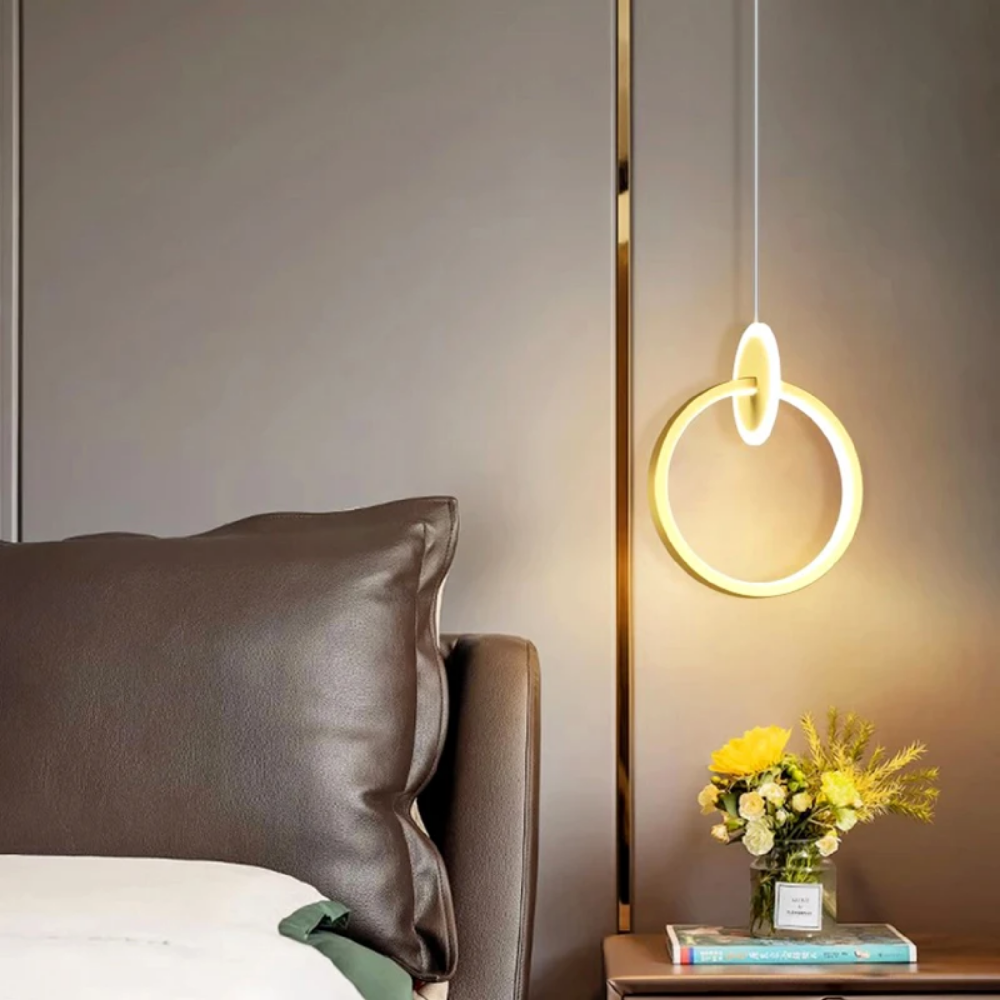 Modern round LED hanging light in a bedroom