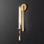 Scandinavian modern wall sconce with clear glass shade in gold