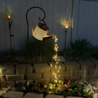 Solar watering kettle lamp enhancing outdoor garden décor