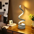 LED spiral bedside lamp on nightstand