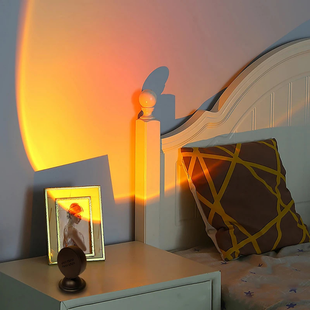 Sunset projection lamp on a bedside table