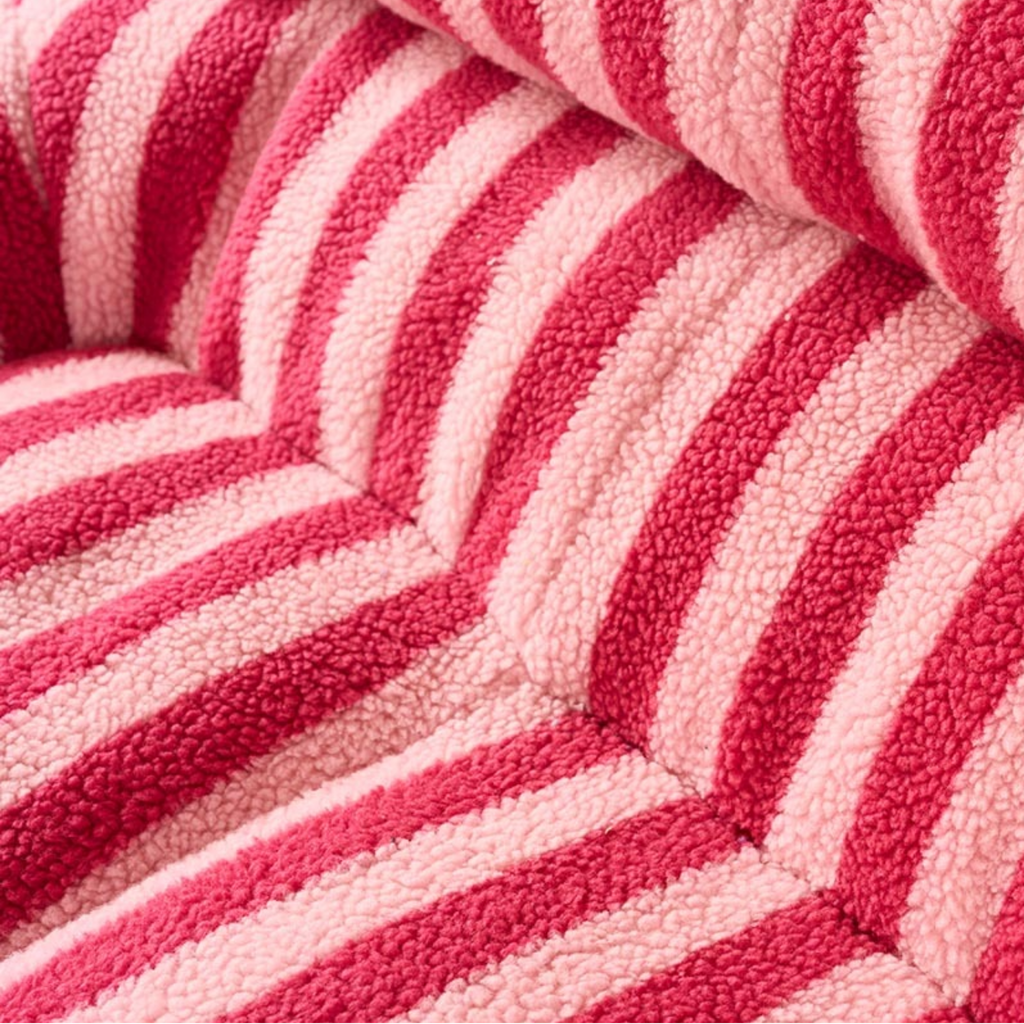 Detailed teddy fleece texture of the sofa