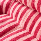 Detailed teddy fleece texture of the sofa