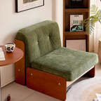 Vintage green sofa in a cozy reading corner