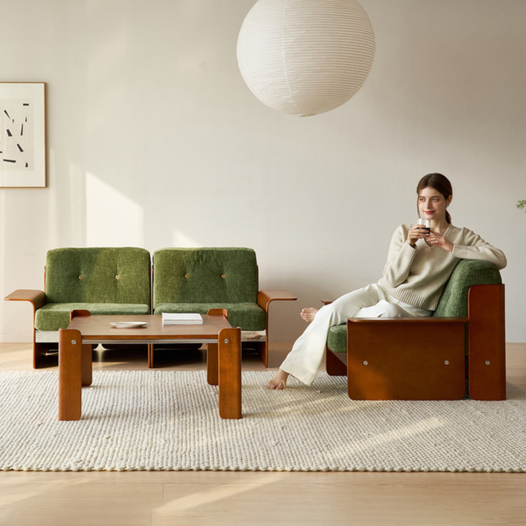 Vintage green modular sofa in a studio apartment