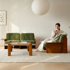 Vintage green modular sofa in a studio apartment