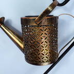 Close-up of the vintage iron kettle design