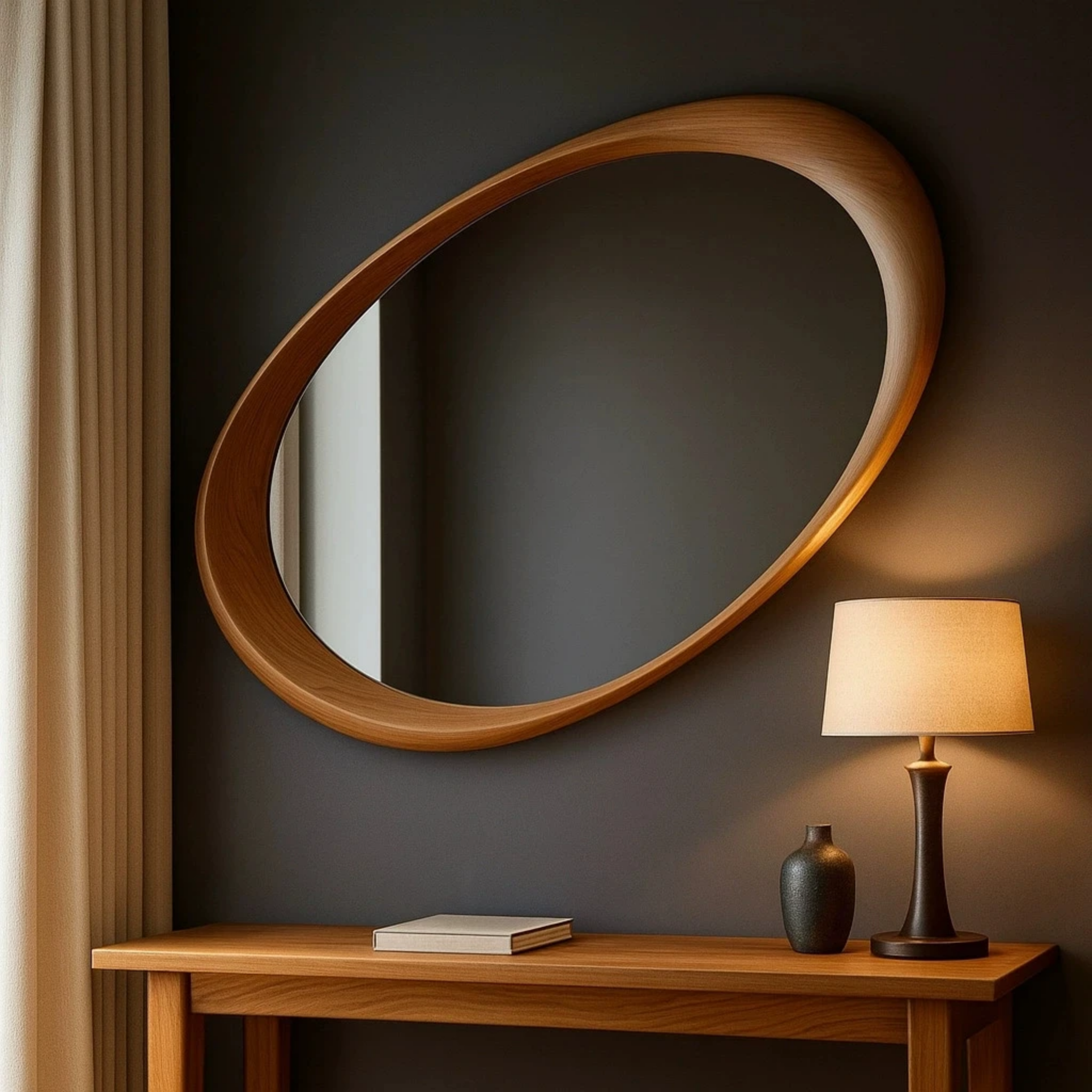 Vintage oval wall mirror in a stylish bedroom