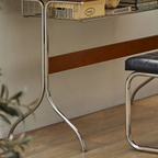 Details of the pine wood writing desk with stainless steel legs