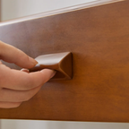 Details of the pine wood writing desk with stainless steel legs
