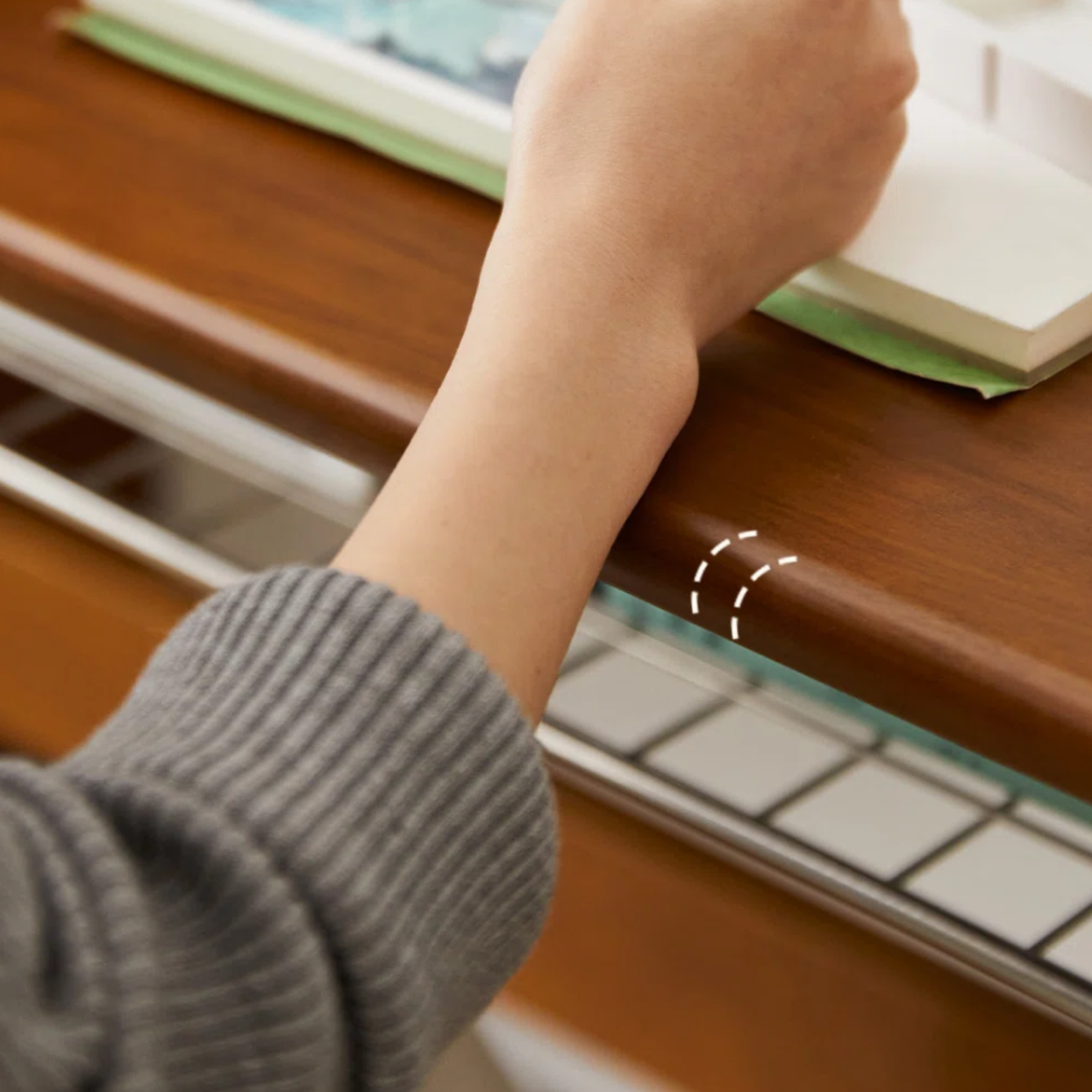 Details of the pine wood writing desk with stainless steel legs