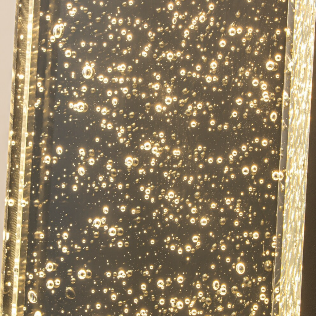 Close-up of the crystal shade on the outdoor wall light
