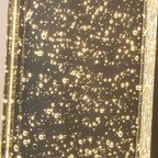 Close-up of the crystal shade on the outdoor wall light