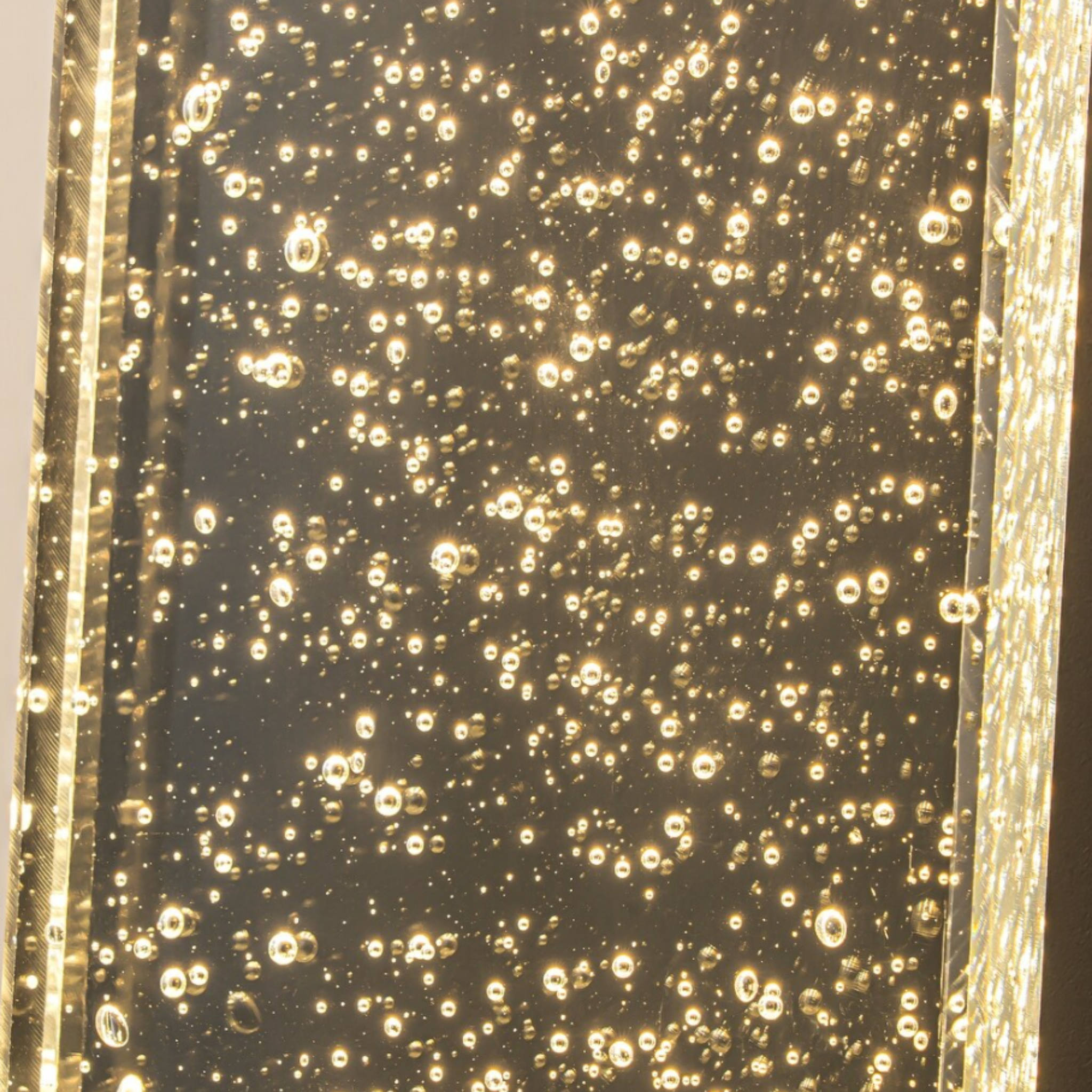 Close-up of the crystal shade on the outdoor wall light