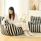 Woman sitting on a teddy fleece sofa